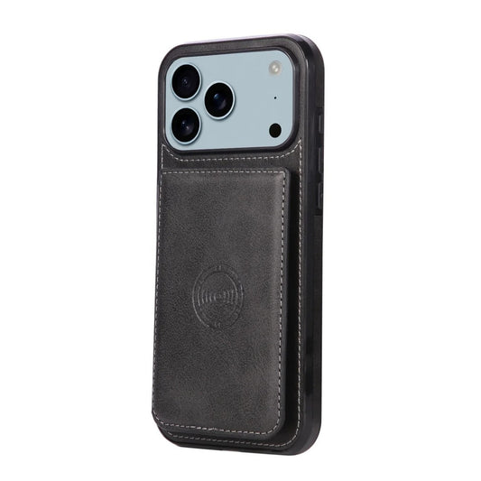 Black leather-look case stands rear-forward with a stitched rectangular wallet below its broad camera opening. A circular embossed emblem decorates the wallet, and black edges frame the case.