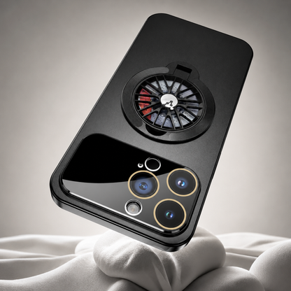 A black case rests diagonally against white folded fabric, showing its glossy camera panel and spoke-patterned rear ring.