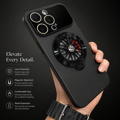 A hand wearing a dark wristwatch holds a black case, showing its broad glossy camera panel and circular spoke-patterned ring.