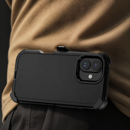 A black rugged phone case clips horizontally to a person's waistband beneath a tan shirt, with its camera lenses facing outward.