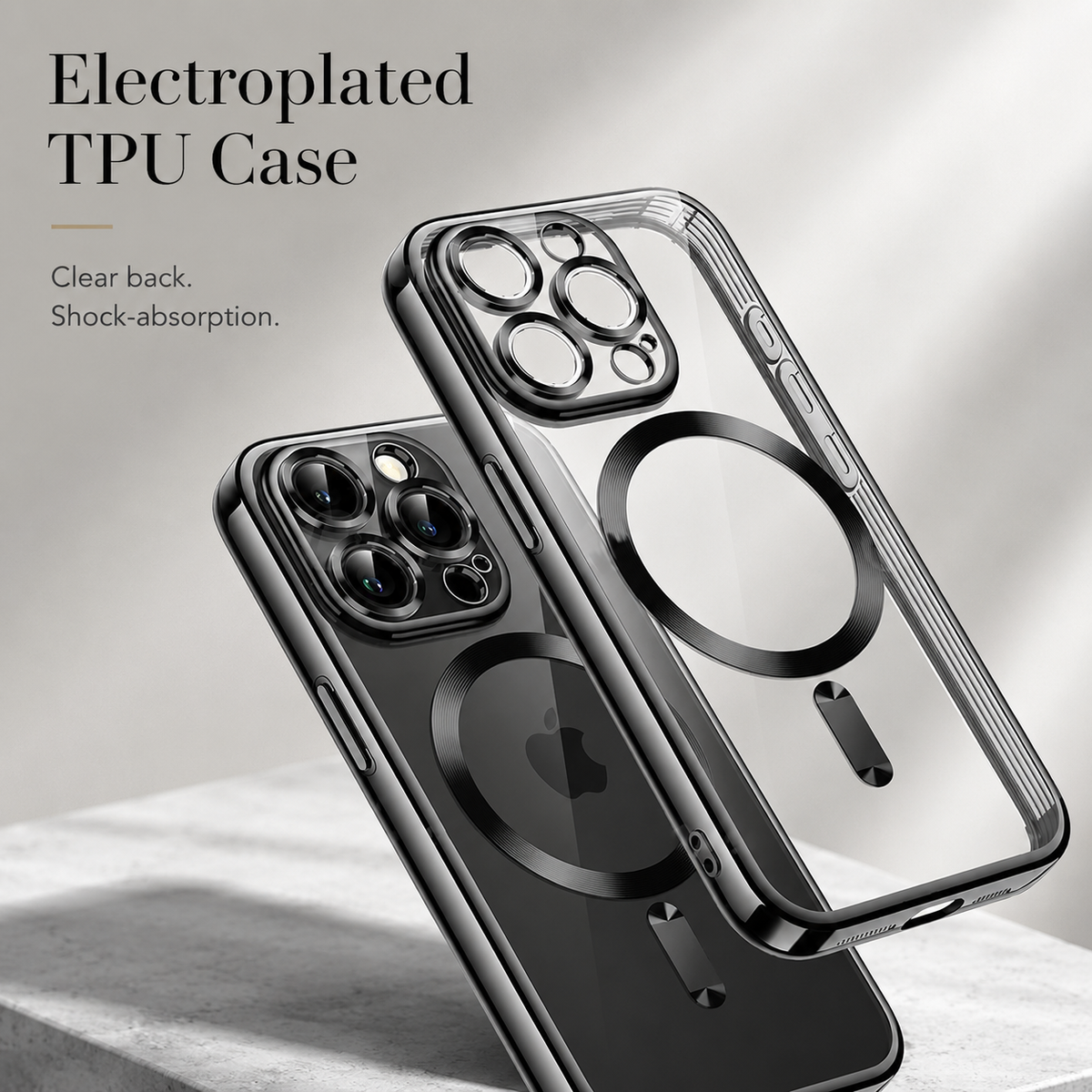 A black phone and an empty transparent case stand at overlapping angles on a pale stone surface. The clear case sits in front, showing round camera openings, a black circular ring, a short bar, and raised sidewalls. The assembled phone behind it shows its rear lenses and logo. Text reads 'Electroplated TPU Case' with brief material captions.