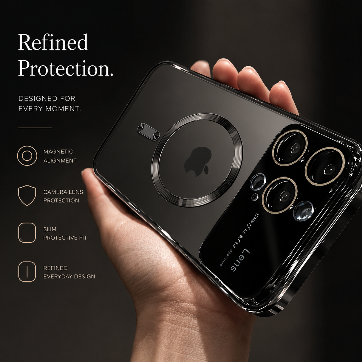A hand holds a reflective dark case horizontally against a soft indoor background. The Apple logo shows within a dark circular magnetic marking, with gold-rimmed camera openings at the right. The heading reads Refined Protection, beside alignment, camera protection, profile and finish labels.