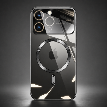 A dark reflective phone case stands upright alone against a gray spotlighted background. A large circular magnetic marking surrounds the Apple logo below the camera panel, with a short bar beneath. Angular white reflections cross its glossy back, and a dark reflection extends onto the surface below.