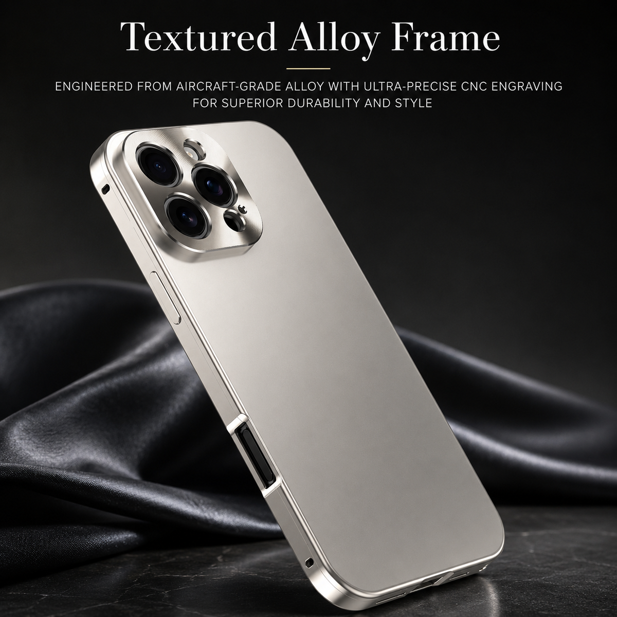 A silver case leans on flowing black fabric, displaying polished flat sides and a raised camera panel. Text advertises a precision-machined alloy frame.