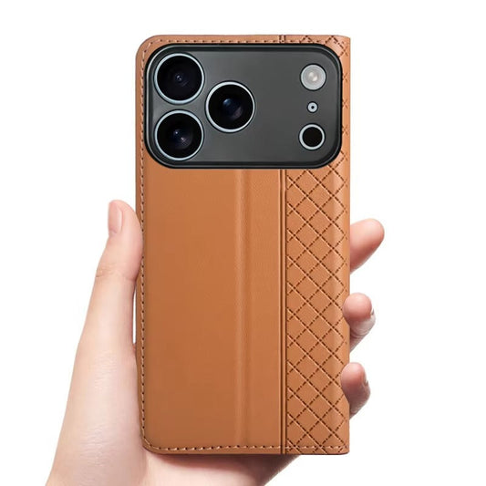 A hand holds the rear of a tan flip-wallet case upright on white. A quilted diamond strip runs down one side beside a smooth stitched panel and broad camera opening.