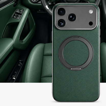 A dark green textured case stands before a green car interior, showing its flat ring stand and silver-colored border around the broad camera panel.