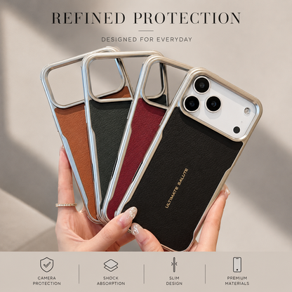 Hands fan out orange, gray, burgundy and black phone cases with reflective metallic borders, showing their textured backs and wide camera openings.