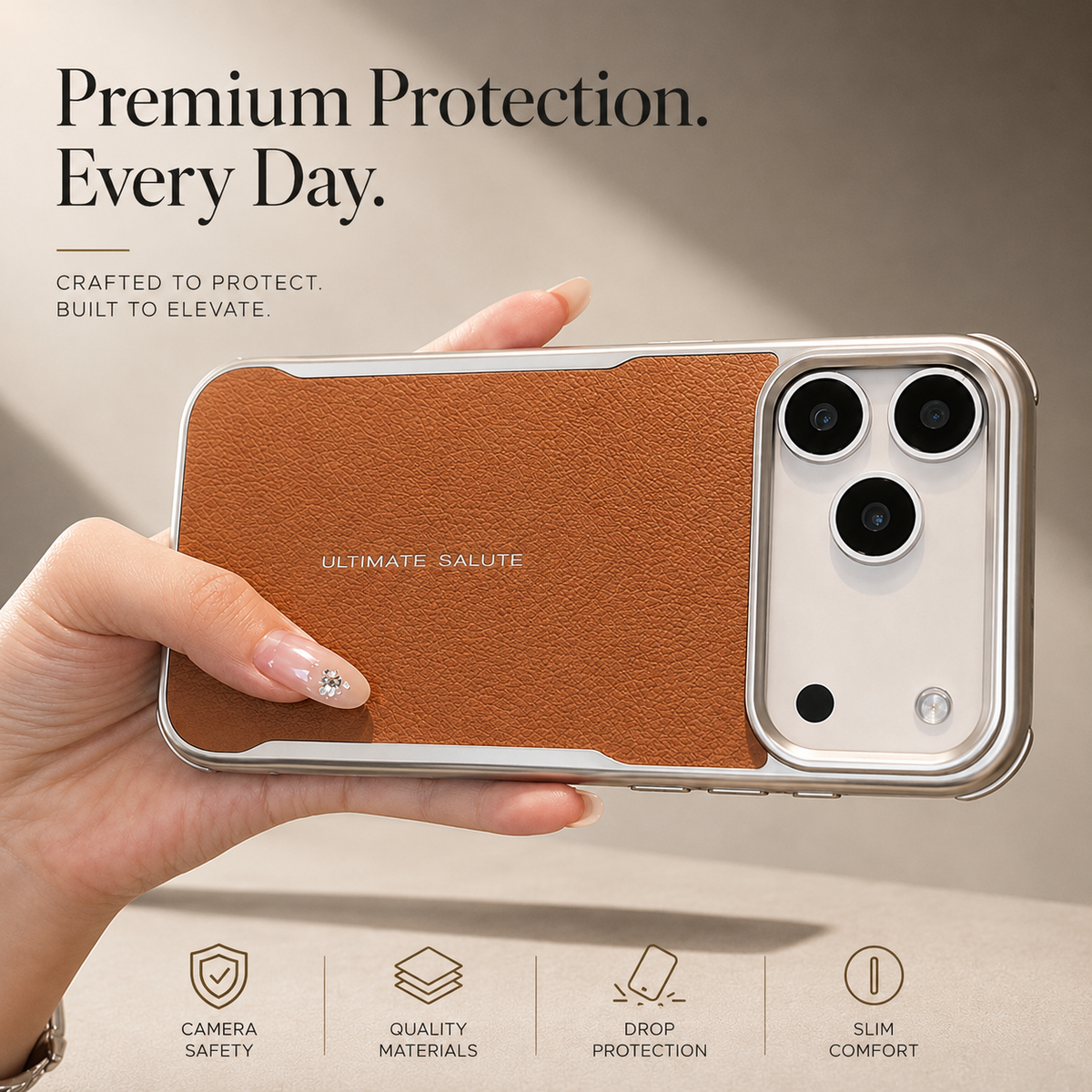 A hand holds an orange textured phone case horizontally, showing its broad camera opening, reflective border and gold lettering.