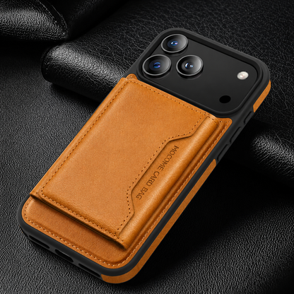 An orange wallet case lies diagonally on black fabric, with a matching stitched rear flap.