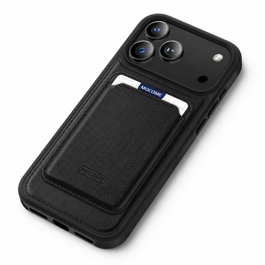 A black case lies diagonally on white with a stitched black card pocket attached to its back. A white-and-blue card protrudes below the broad camera panel.