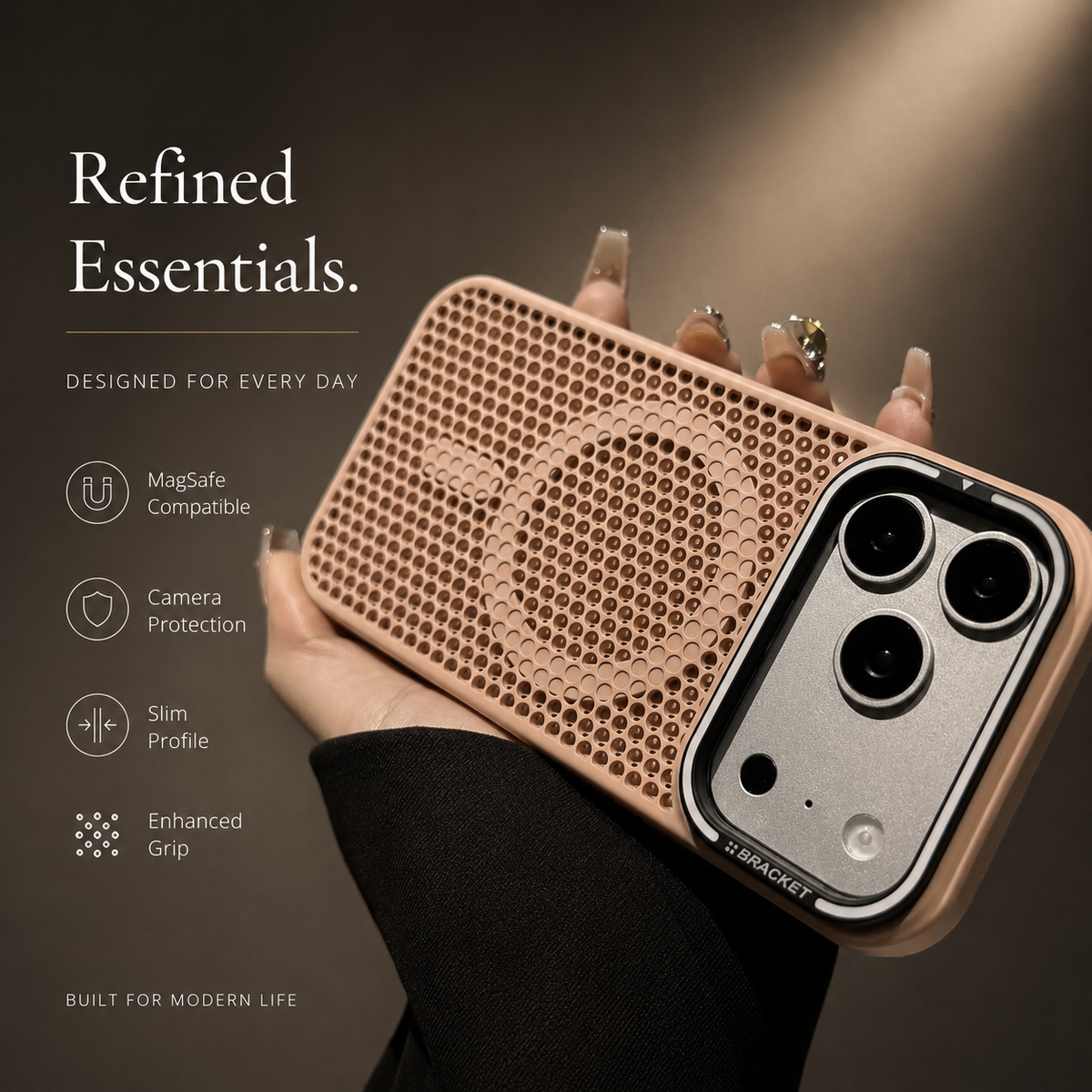 A hand holds a pale pink perforated phone case horizontally, showing its circular rear ring and broad silver-edged camera frame. Text advertises MagSafe compatibility and protection.