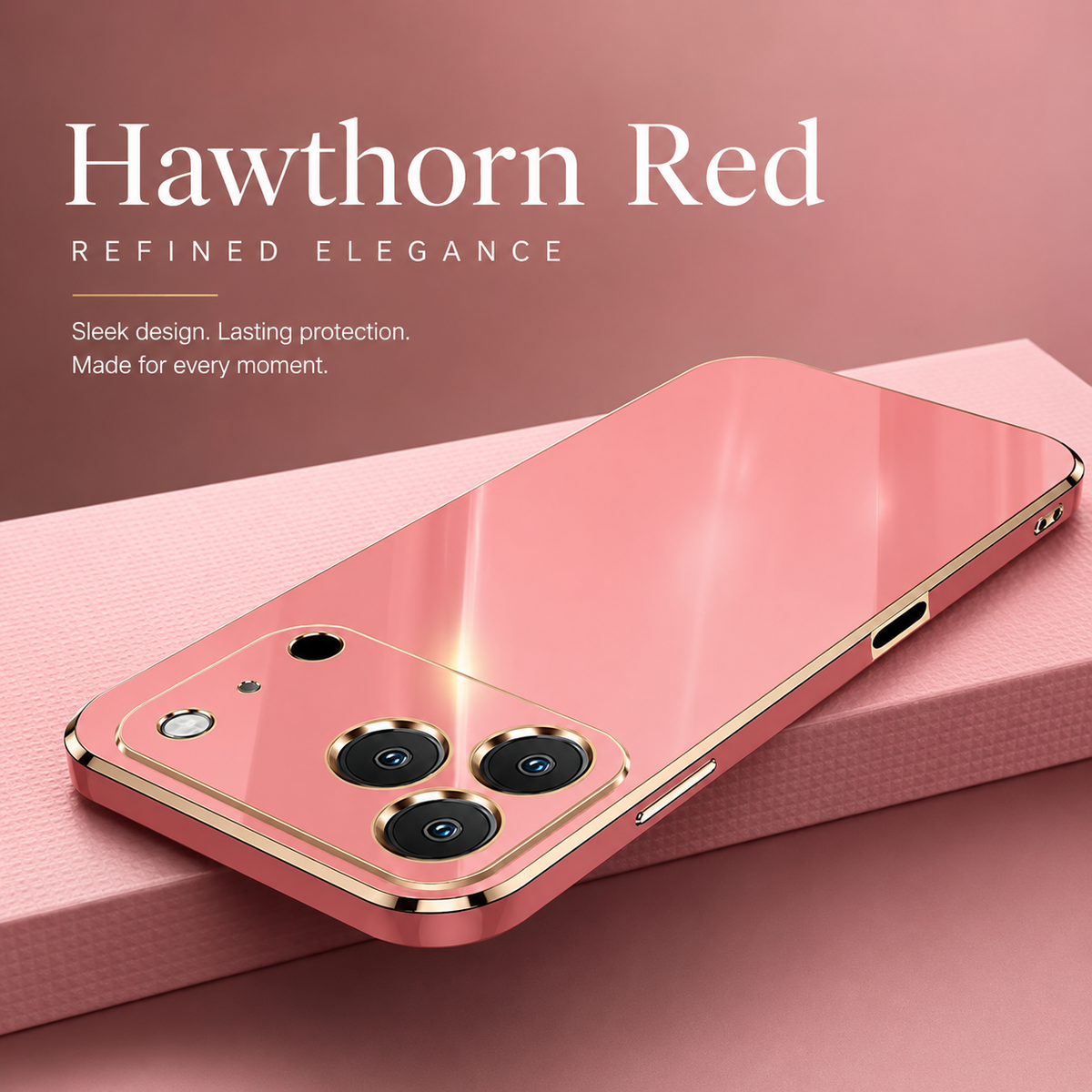 Pink reflective phone case lying diagonally on pink fabric, with gold-colored edging and individual camera outlines. The graphic names the color 'Hawthorn Red'.