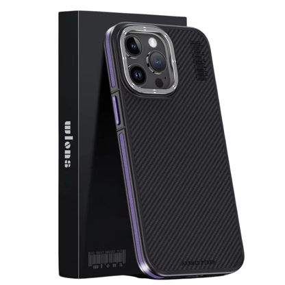 A black diagonally woven phone case stands at a slight angle in front of a tall black retail box against a white background. Purple accents trace the exposed side and button covers. A silver-colored rectangular surround frames three rear camera lenses above the otherwise plain patterned back.