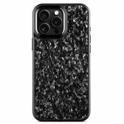 A black phone stands upright against a white background with its rear facing the viewer. Irregular gray and black fragments form a mottled pattern across the case's back. A black raised rectangular surround with a silver-colored edge frames three camera lenses at the upper left, and rounded black borders outline the case.