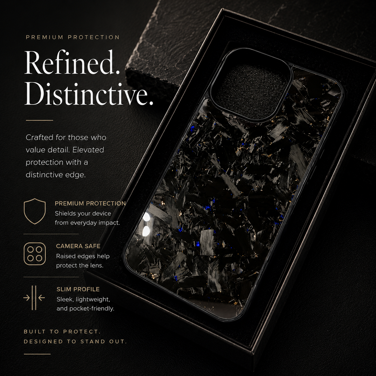 A glossy black case with pale gray fragments and scattered yellow-gold flecks rests at an angle in a black presentation tray. Promotional text highlights protection and slimness.