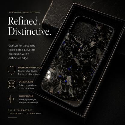 A glossy black case with pale gray fragments and scattered yellow-gold flecks rests at an angle in a black presentation tray. Promotional text highlights protection and slimness.