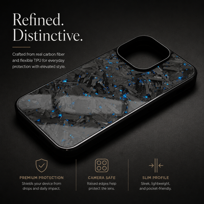 A black-edged case with gray fragments and blue flecks lies diagonally on a dark surface. Its glossy back reflects light; text highlights protection, raised edges and a slim profile.