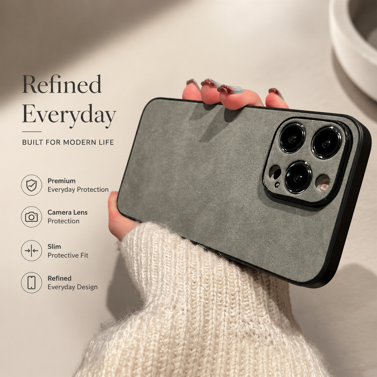 Hand holds a gray suede-look case horizontally, showing its plain mottled back, black edges, and matching camera panel beside promotional protection text.