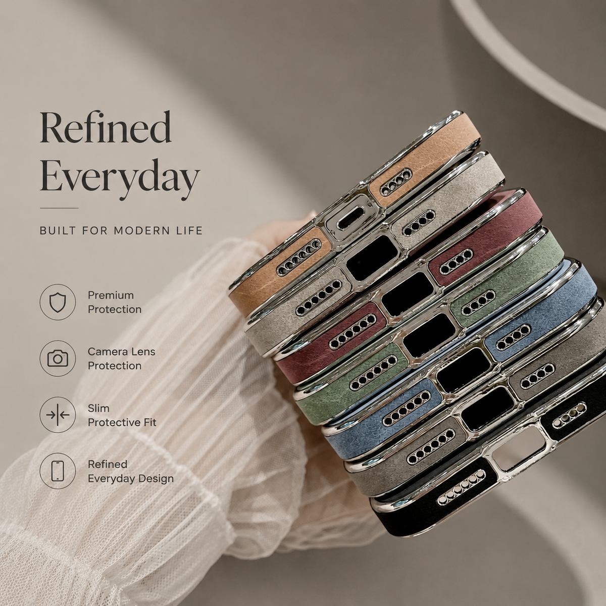 Hand holds a stack of suede-look cases bottom-edge forward. Their centered charging ports, speaker holes, and differently colored back panels appear beside promotional protection text.