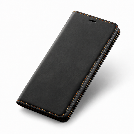 A closed black suede-look flip phone case lies diagonally on white, with brown edge stitching and a small horizontal earpiece slit near the top.