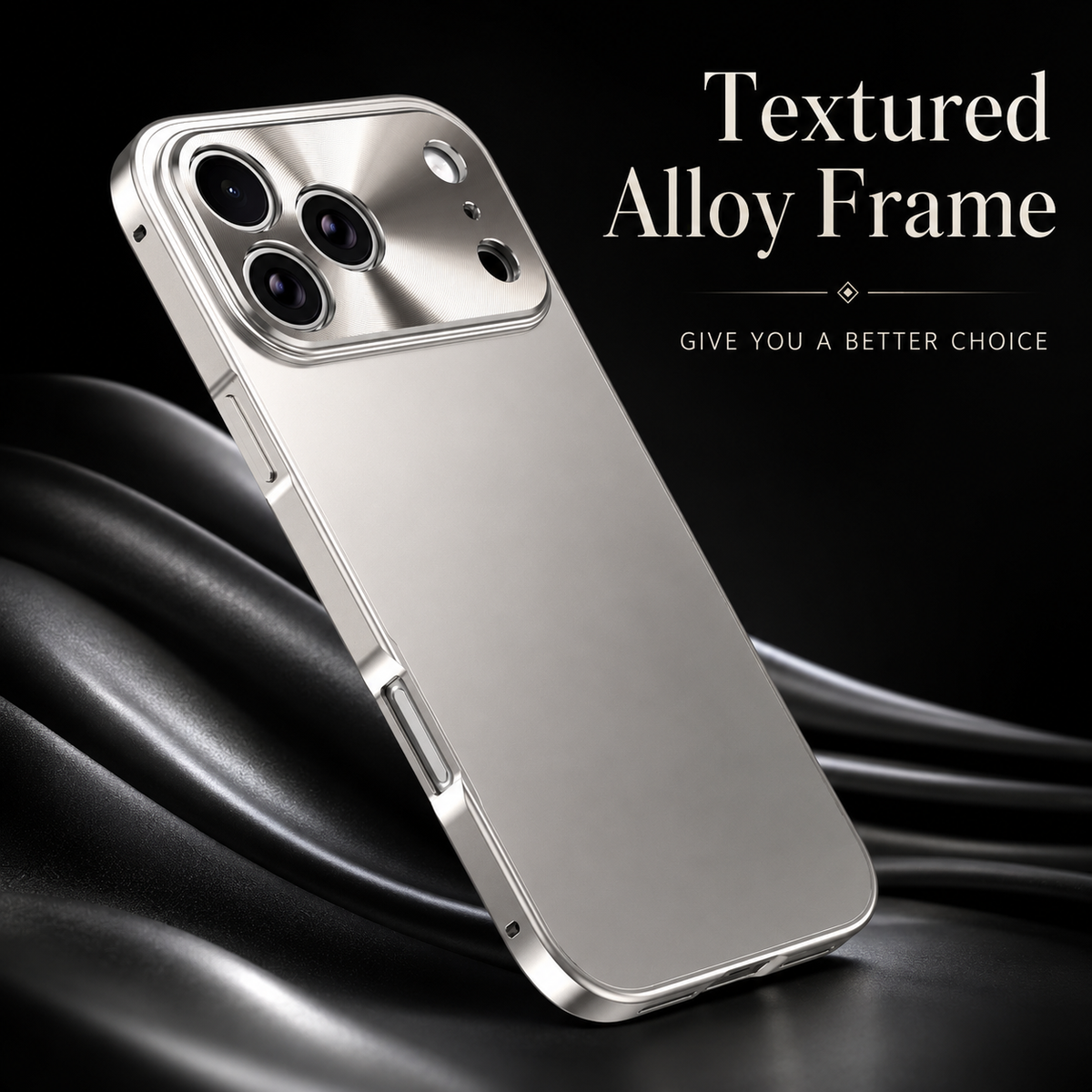 A silver-colored phone case floats above shiny black folds, showing its plain matte back and raised camera panel. Text describes a textured alloy frame.