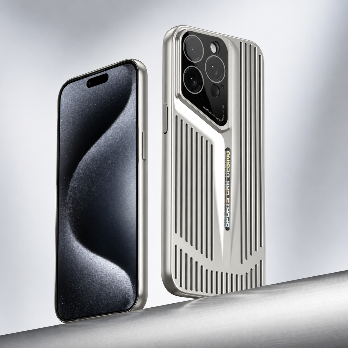 Front and rear views show a silver slotted case on a curved pale platform, with a slanted camera panel and tapered central ridge.