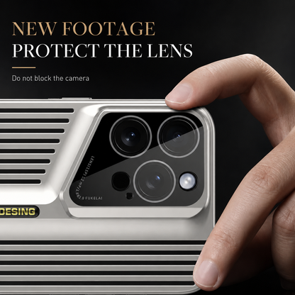 A close-up shows a hand gripping the raised slanted border around a silver case's camera panel. Long slots and small central lettering remain visible.