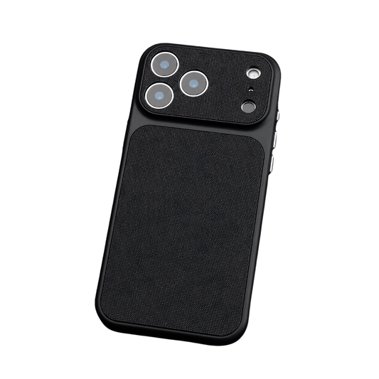 A black phone case appears at an angle against white, with fine woven-style panels on its back and broad camera cover, separate circular lens openings and silver-colored side buttons.