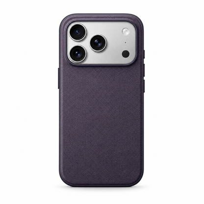 Rear view of a muted purple phone case standing upright against a white background. Its broad back has a fine woven fabric texture, framed by a smooth matching rim. A wide rectangular opening at the top surrounds three camera lenses, flash and sensor. Covered buttons project slightly from the sides.