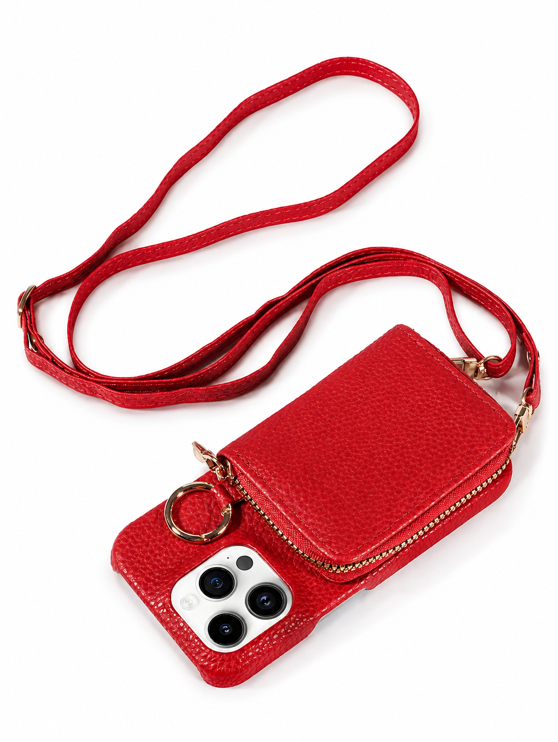 A red textured phone case lies on white with a matching long strap looped above it. A rectangular zippered wallet pouch covers most of the back beside a gold-colored ring.
