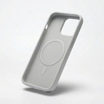 Interior of a light gray phone case shown at an angle, revealing a recessed circular ring and short bar, camera opening and molded side buttons.