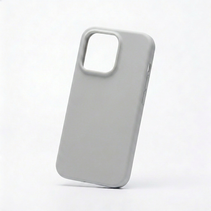 An empty light gray phone case leans at a slight angle against white. Its smooth plain back has a large raised rectangular camera opening at the upper left, while covered buttons and smaller openings are visible along the side.