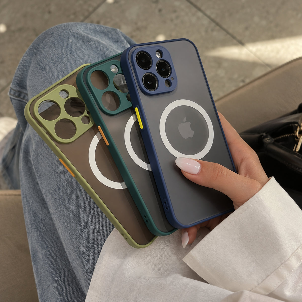 Image showing three Colourful Phone Casesin Hand, featuring iphone hard matte magsafe case with anti-fingerprint finish & slim protection.