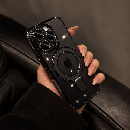 A hand with manicured nails holds a glossy black magnetic phone case with a kickstand, shown against a dark leather background.