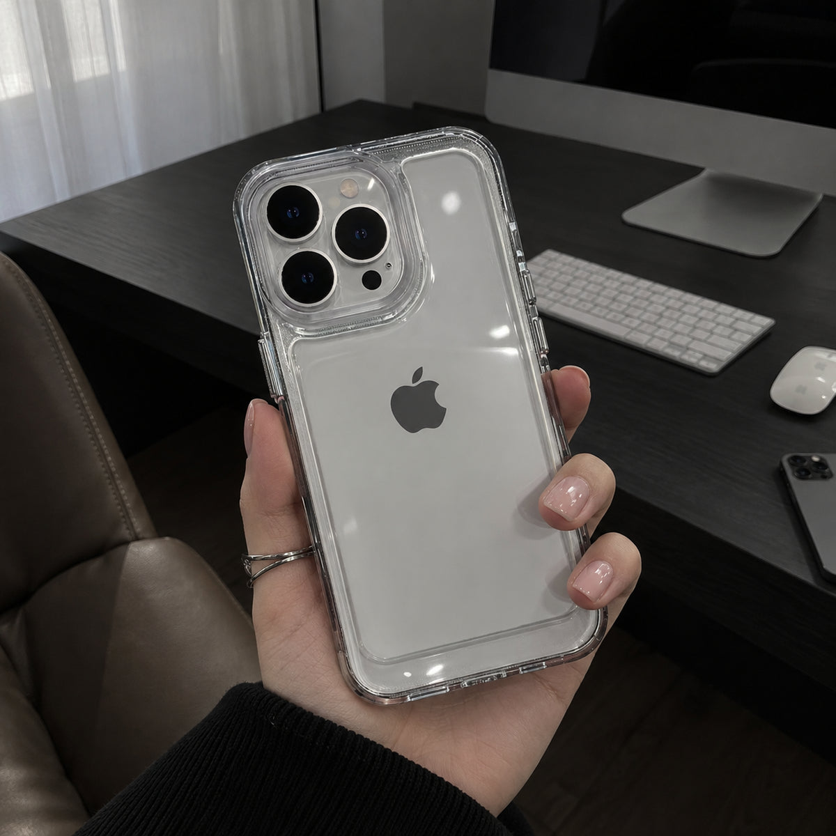 Image of iphone 18 clear shockproof case, showing iphoneinaminimalistworkspace.